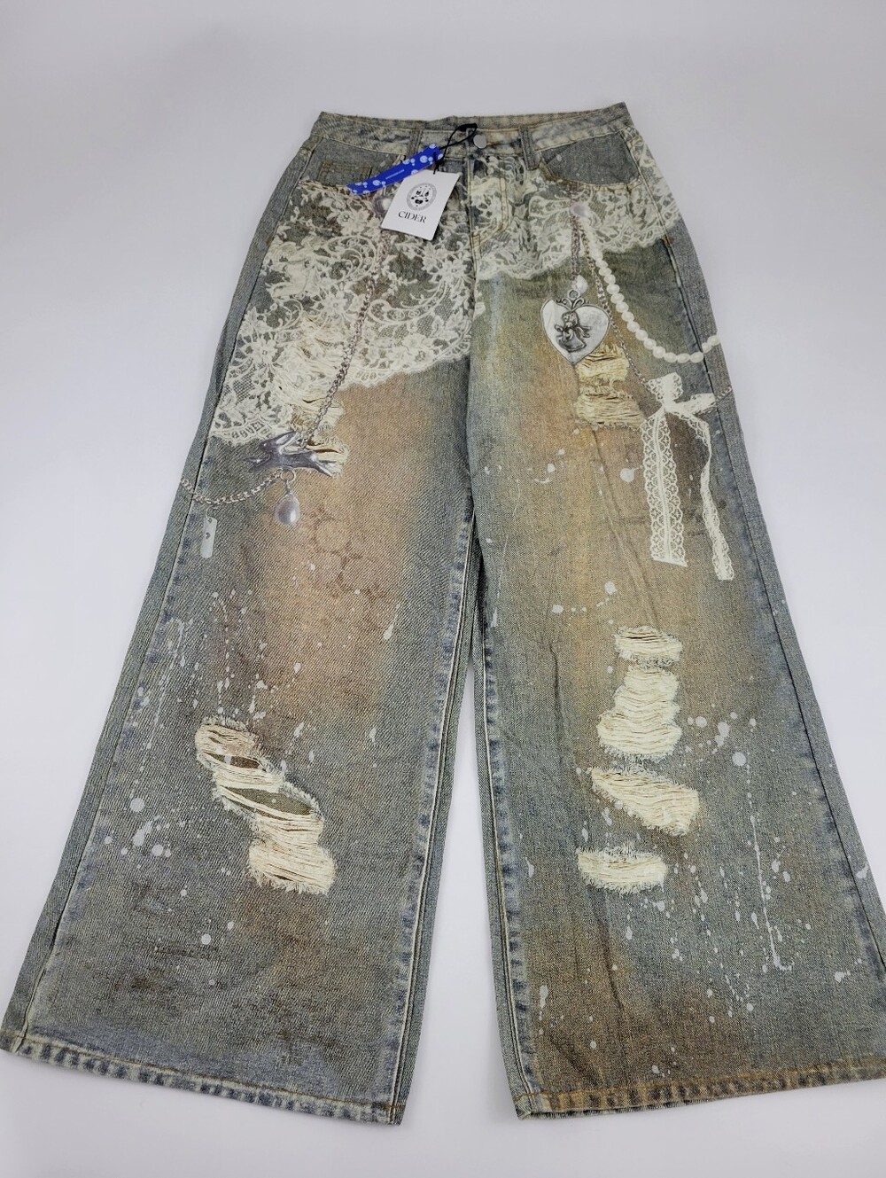 Cider Indigo Distressed Lace-Print Wide Leg Jeans in Washed Light Blue